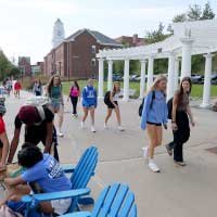 students walking on campus